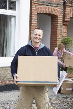 Moving boxes and furniture being prepared for a flat removal in Balham